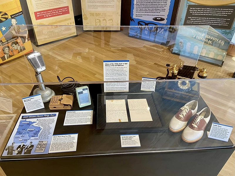 The Traveling Museum display case holds many artifacts of musical history.